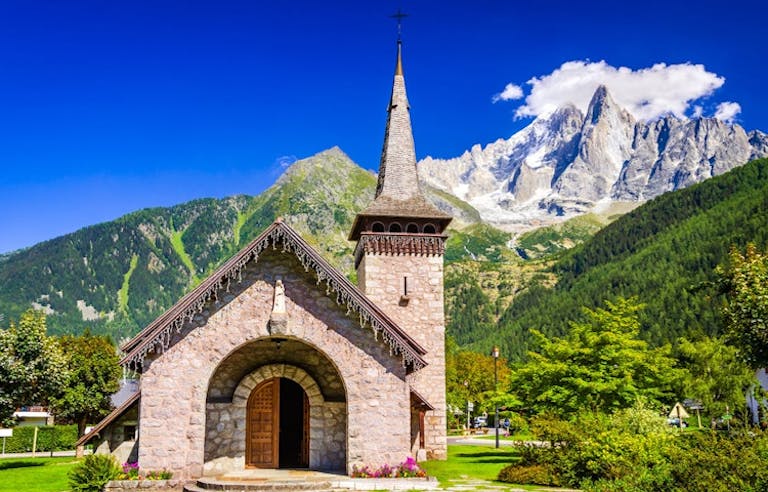 traditional stone church building near the Matterhorn mountains in the Alps region near Chamonix in Europe