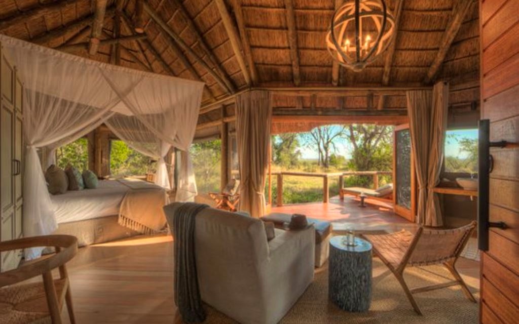 Bedroom view of a luxury jungle safari lodge in Camp Moremi in Botswana