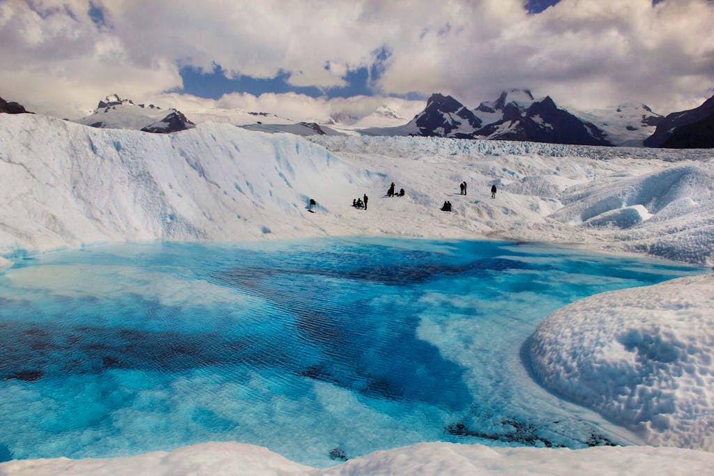 Group trekking Patagonia's glacial wilderness | A popular tourist attraction located near Tierra Patagonia Hotel & Spa
