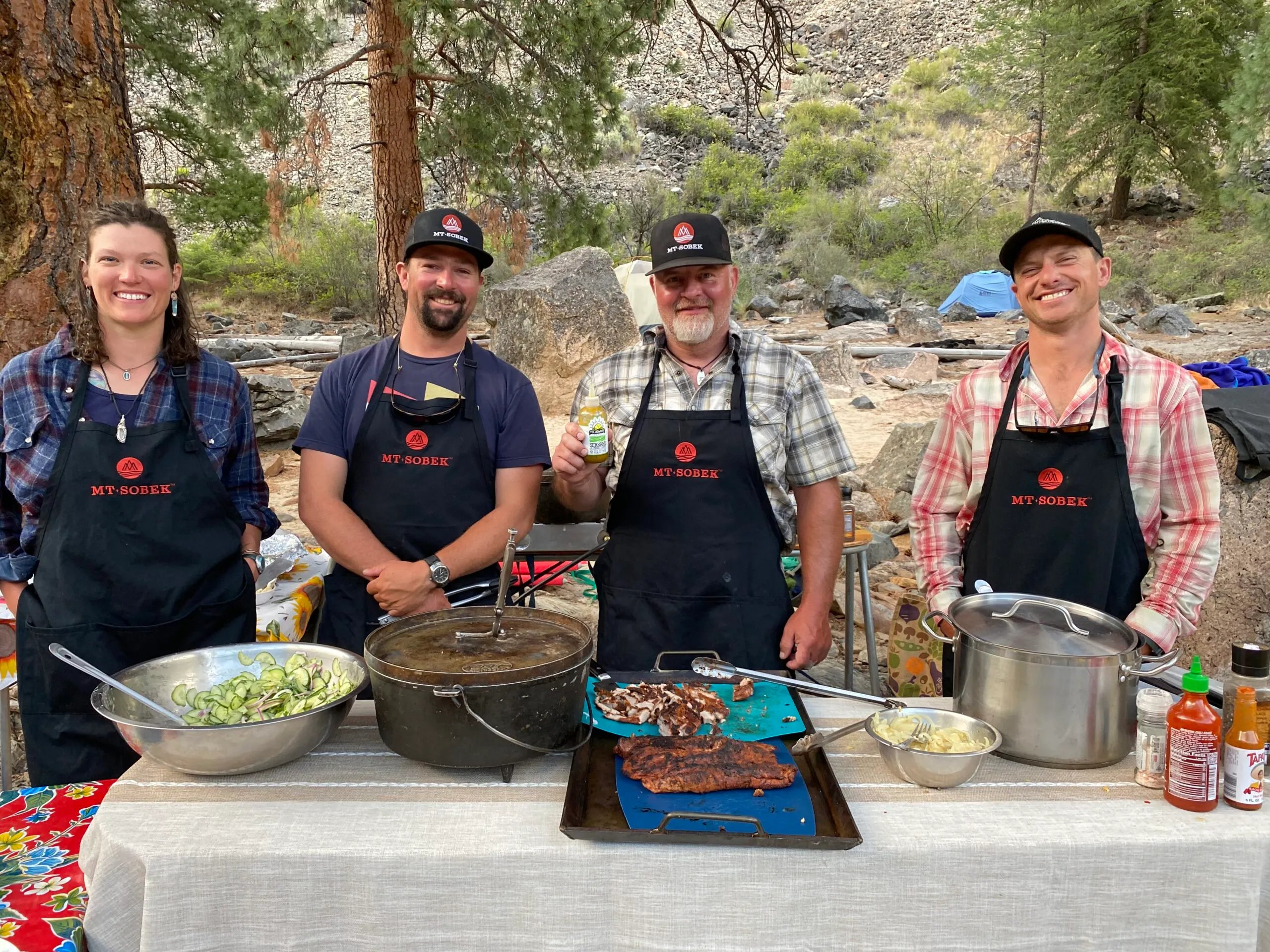 Private chefs cooking a gourmet meal along Idaho's Middle Fork of the Salmon River