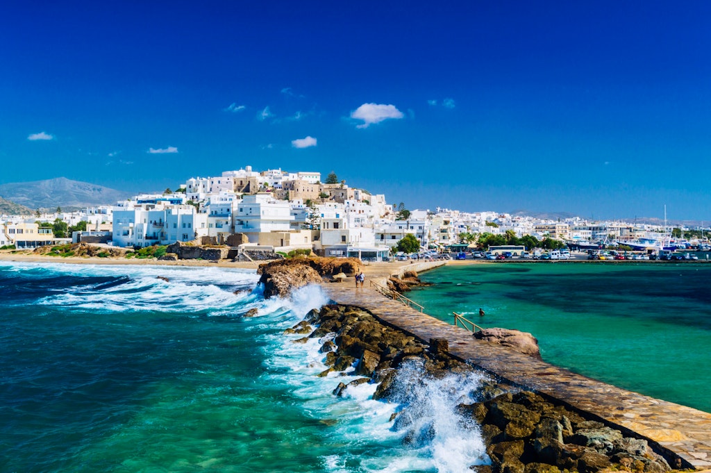 Waves hitting the shoreline in Naxos town on the Cyclades archipelago in Greece