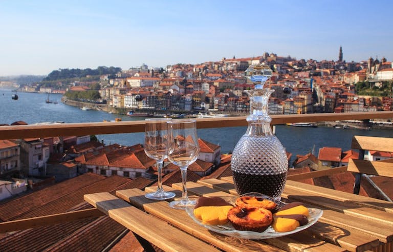 Port wine and traditional sweet pastries with a view in Portugal's foodie capital, Porto