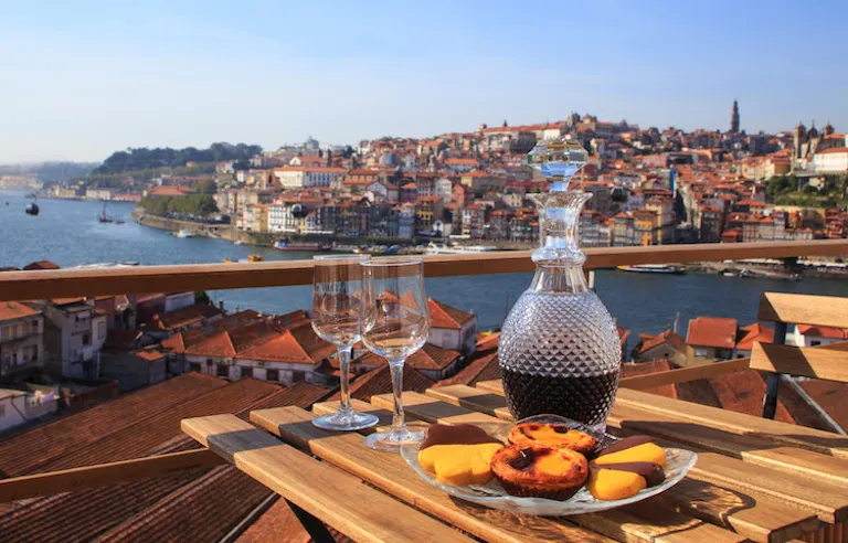 Port wine and traditional sweet pastries with a view in Portugal's foodie capital, Porto