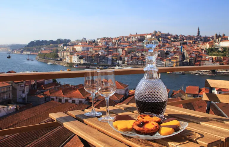 Port wine and traditional sweet pastries with a view in Portugal's foodie capital, Porto