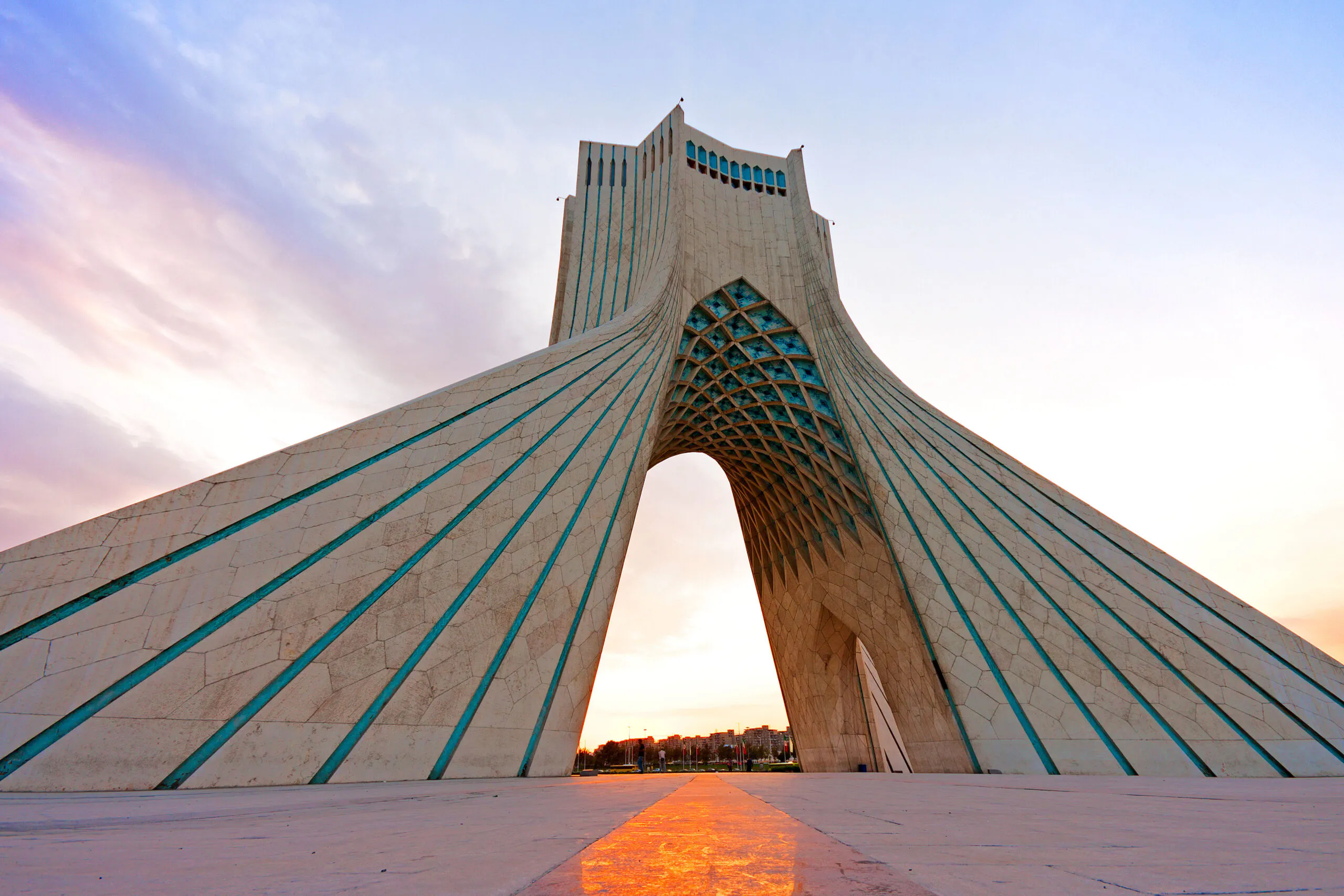 Tourists exploring Iran's historic site - traditional Jameh mosque in Iran