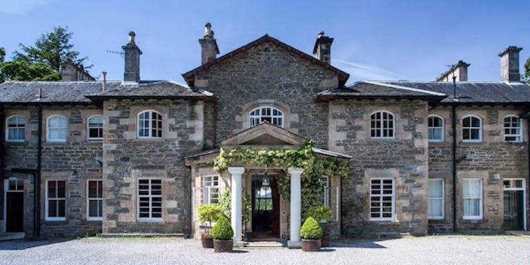 Tourists who are seeking an overnight stay at a local hotel checks out Coul House Hotel-Contin in Scotland, Europe