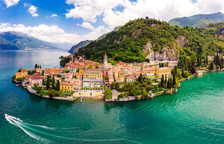 Enjoy a lovely boat ride around Wayfarer's Trail in Lake Como - a hidden gem in Italy
