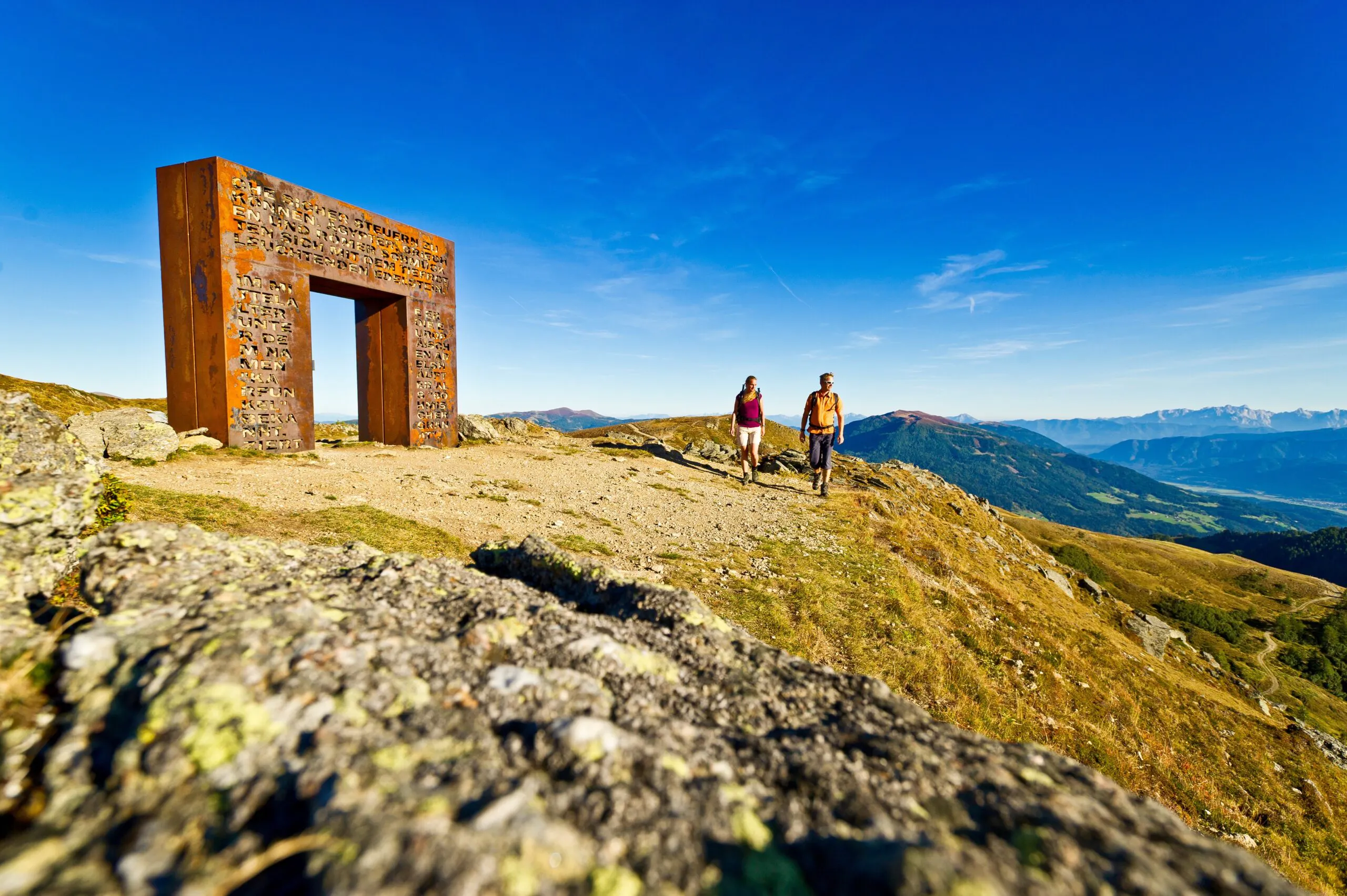 Hikers enjoying photo worthy views of Hohe Taurern National Park in Europe