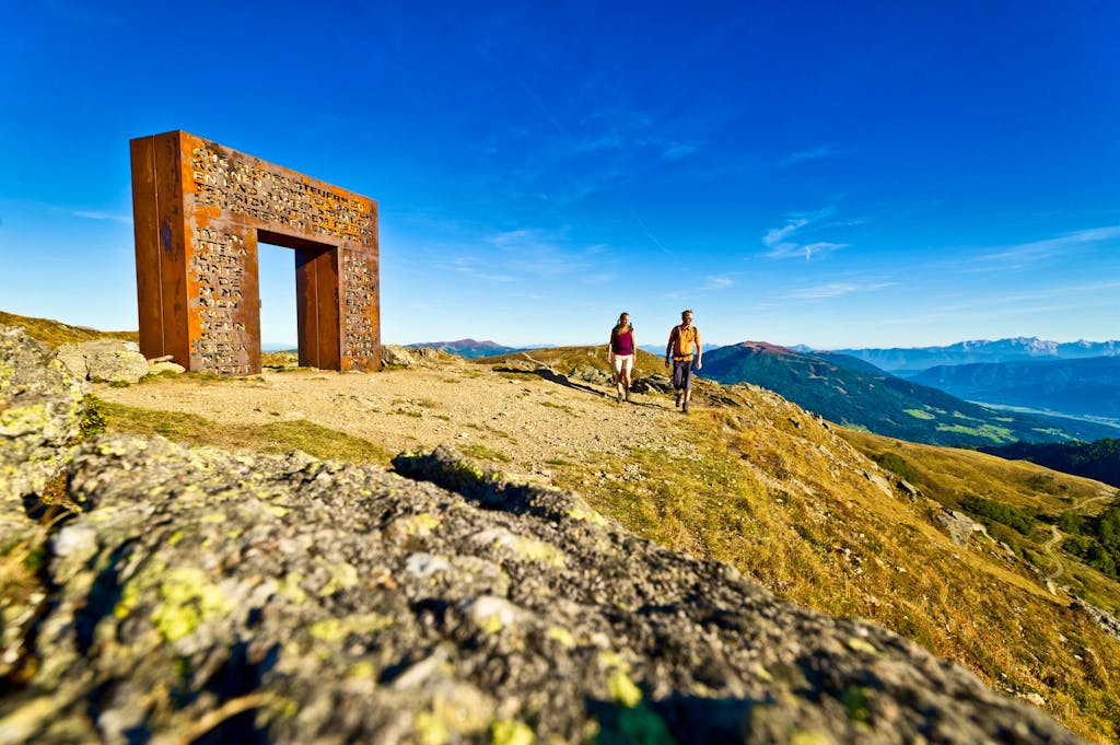 Hikers enjoying photo worthy views of Hohe Taurern National Park in Europe
