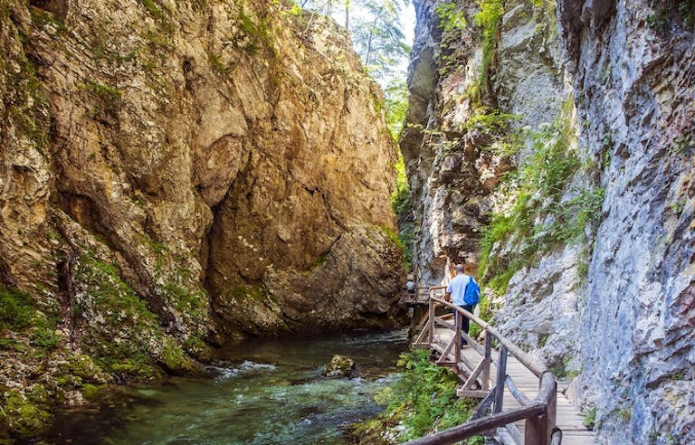 Solo hiker hiking the 80,000 foot long Postojna Caves in Slovenia