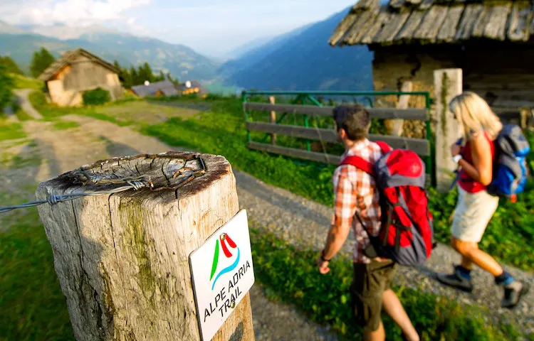A couple hiking the famous Alpe Adria 470 mile trail from the Alps to the Adriatic Sea