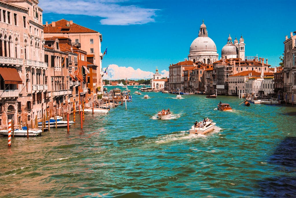 Taking a leisure boat ride through the picturesque city of Italy, Venice