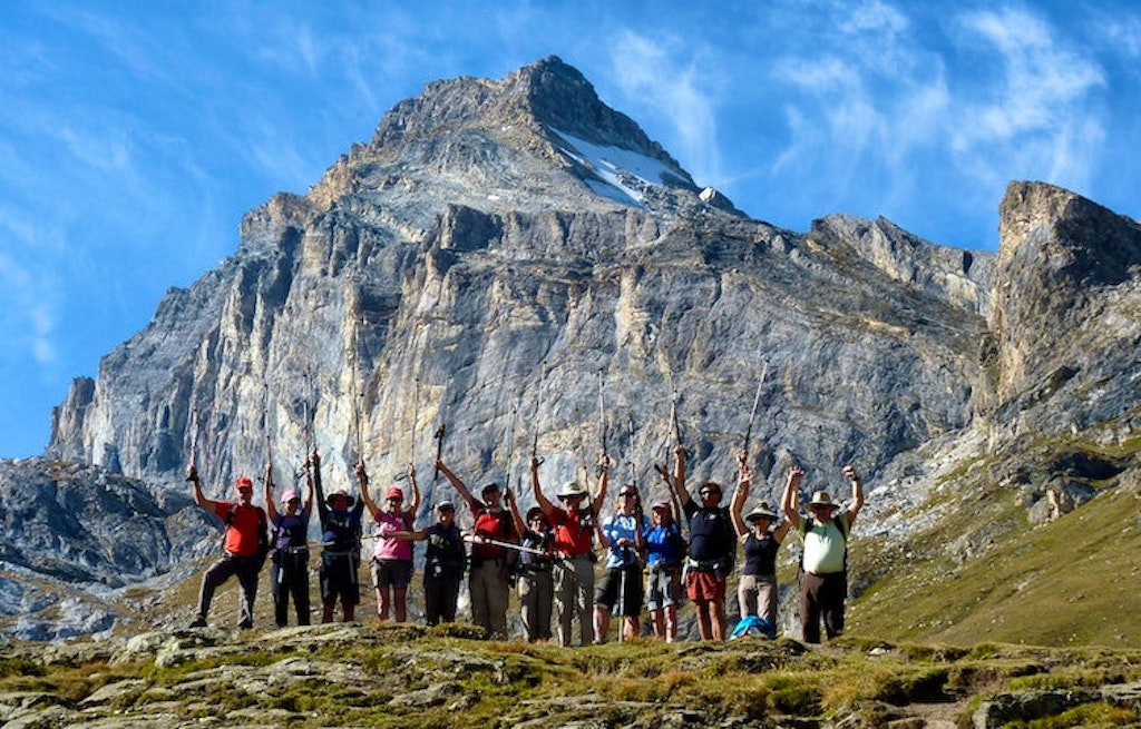 Group of hikers on a guided trek through heart of Gran Paradiso with days in both Switzerland and Italy