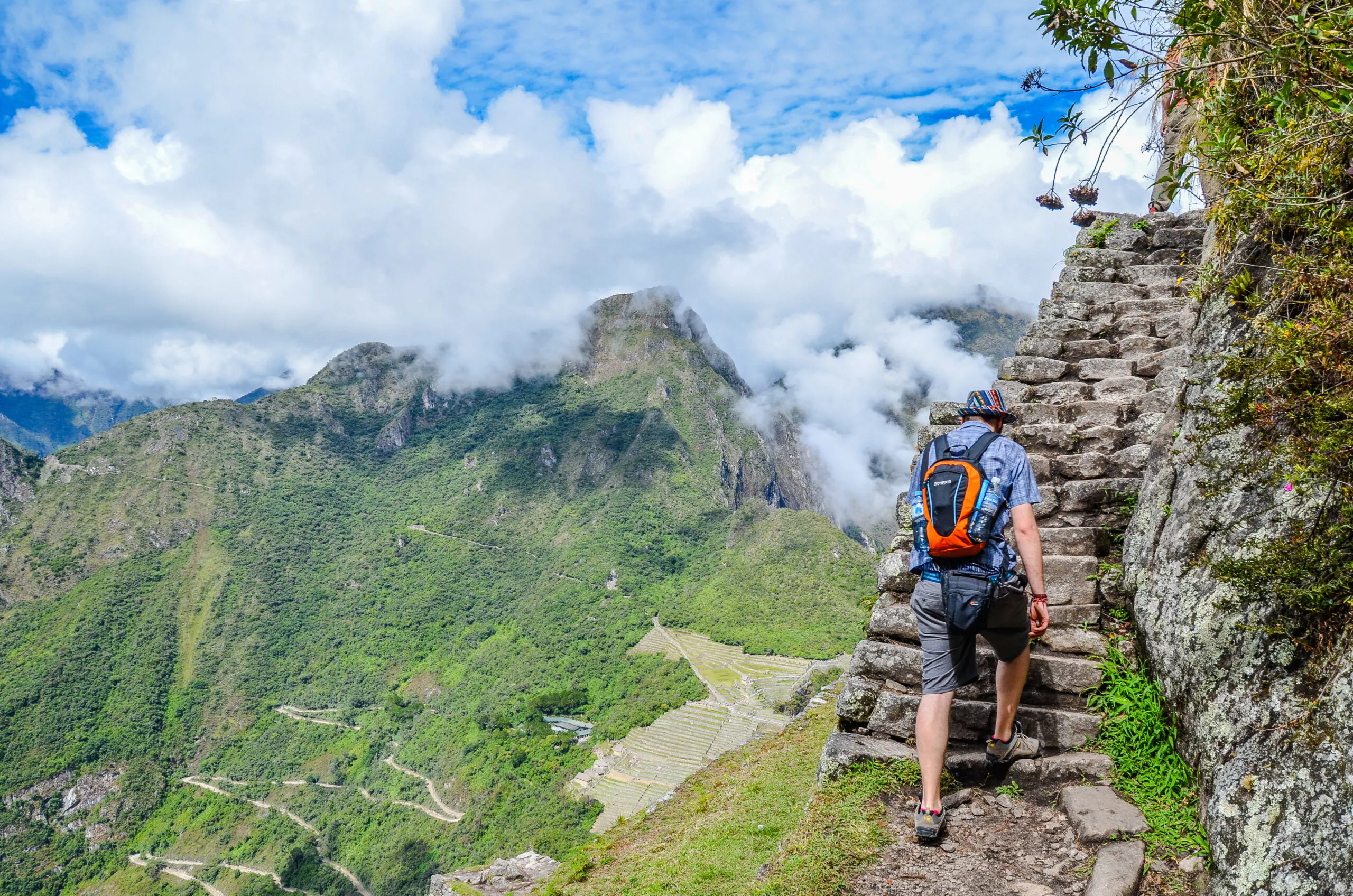 male solo hiker walking on ancient Inca trail to Machu Picchu
