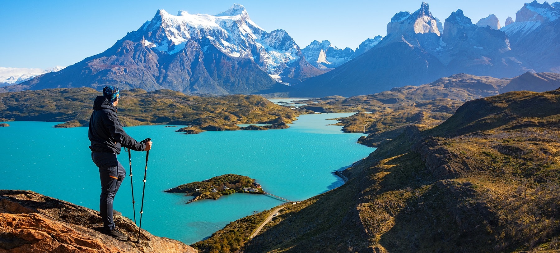 Hiker in Patagonia looking at mountains