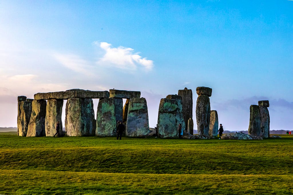 History buffs visit the mysterious Stonehenge ring of boulders during their England walking tour