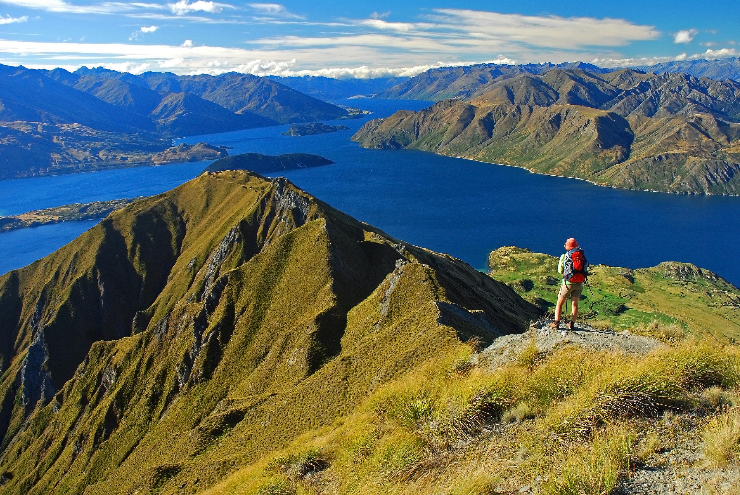 solo hiker journeying to Wanaka, located near Mount Aspiring National Park, in South Island of New Zealand, Europe
