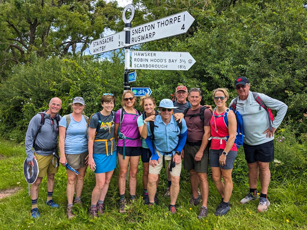 Group of trekkers both young and old on England hiking adventure