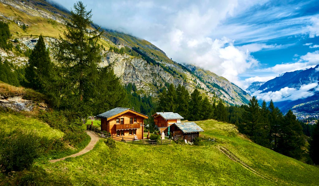 Stay at a mountain lodge in Arolla on the Haute Route trail in the Alps mountain range in Europe