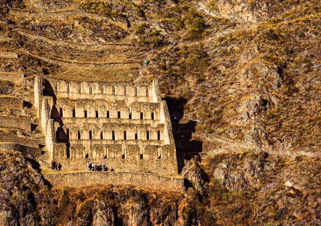 Discovering Ollantaytambo - old Inca fortress and town the hills of the Sacred Valley (Valle Sagrado) in the Andes mountains of Peru South America