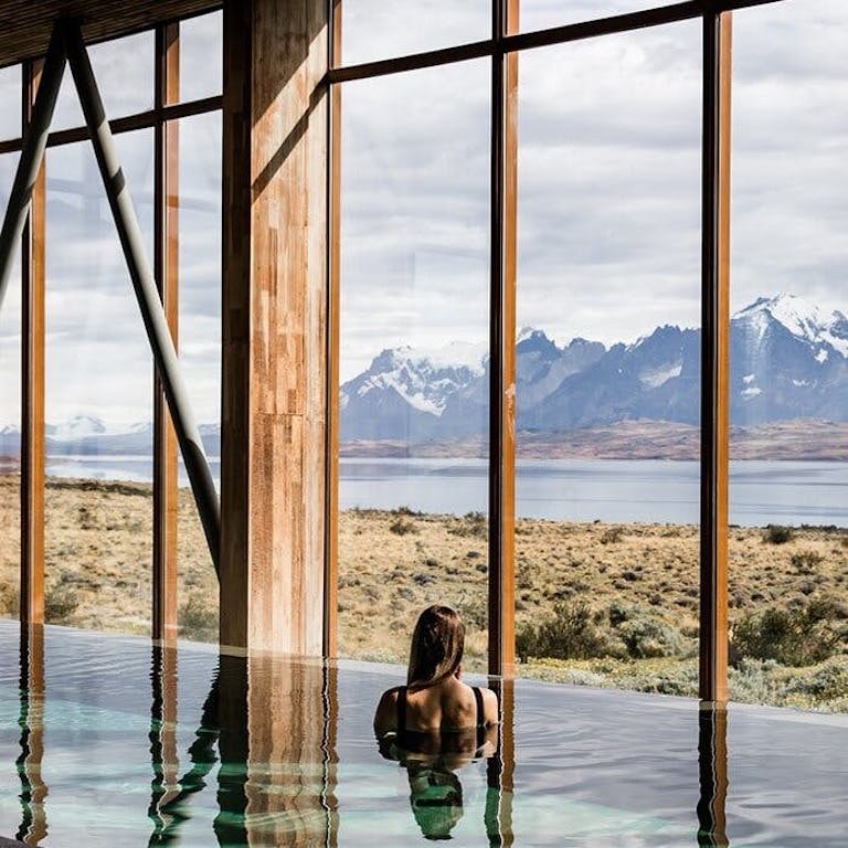 female tourist in a pool inside Tierra Patagonia Hotel in Argentina