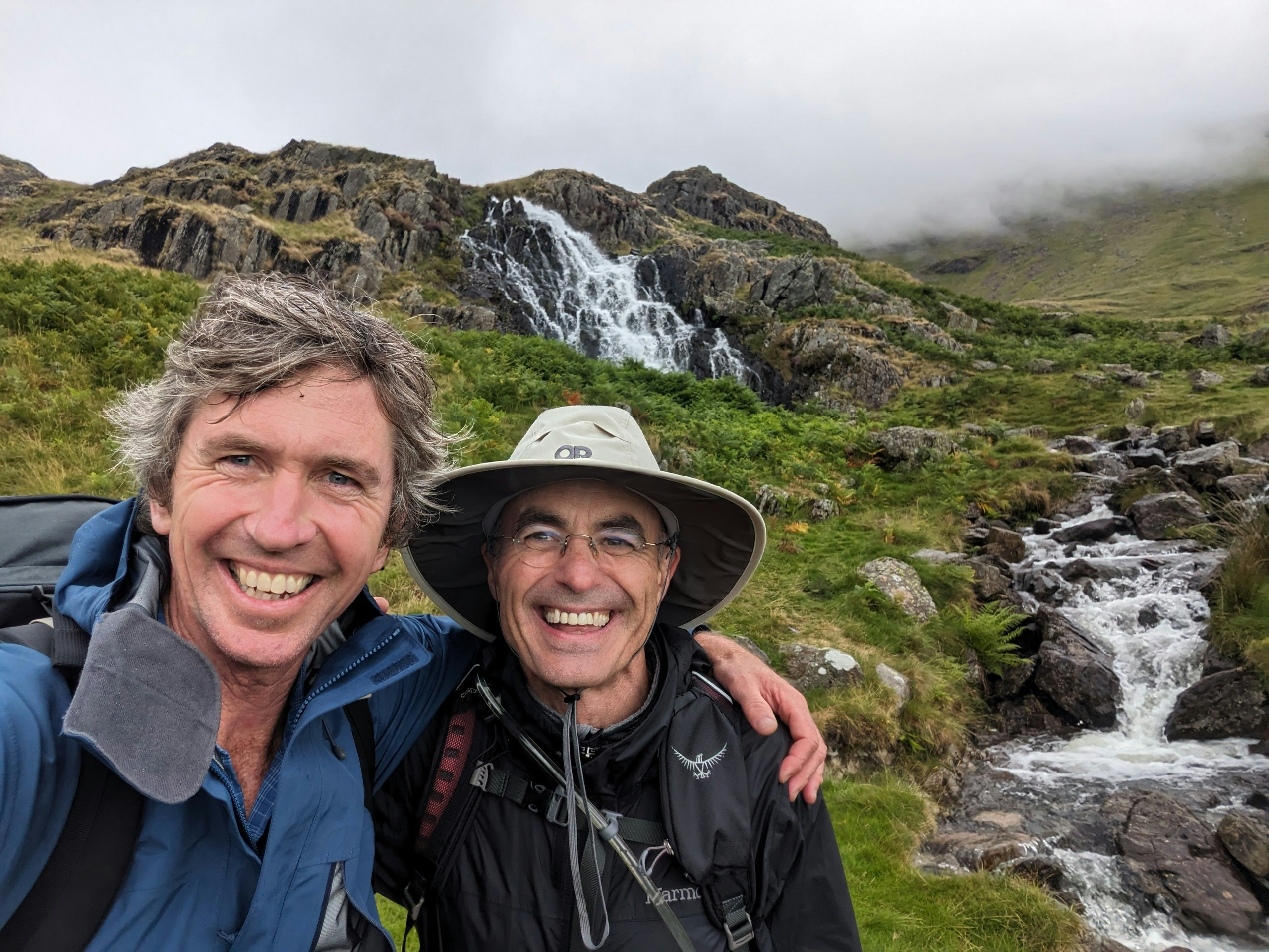 male travelers on a guided hiking adventure exploring the England Coast to Coast trail in Europe