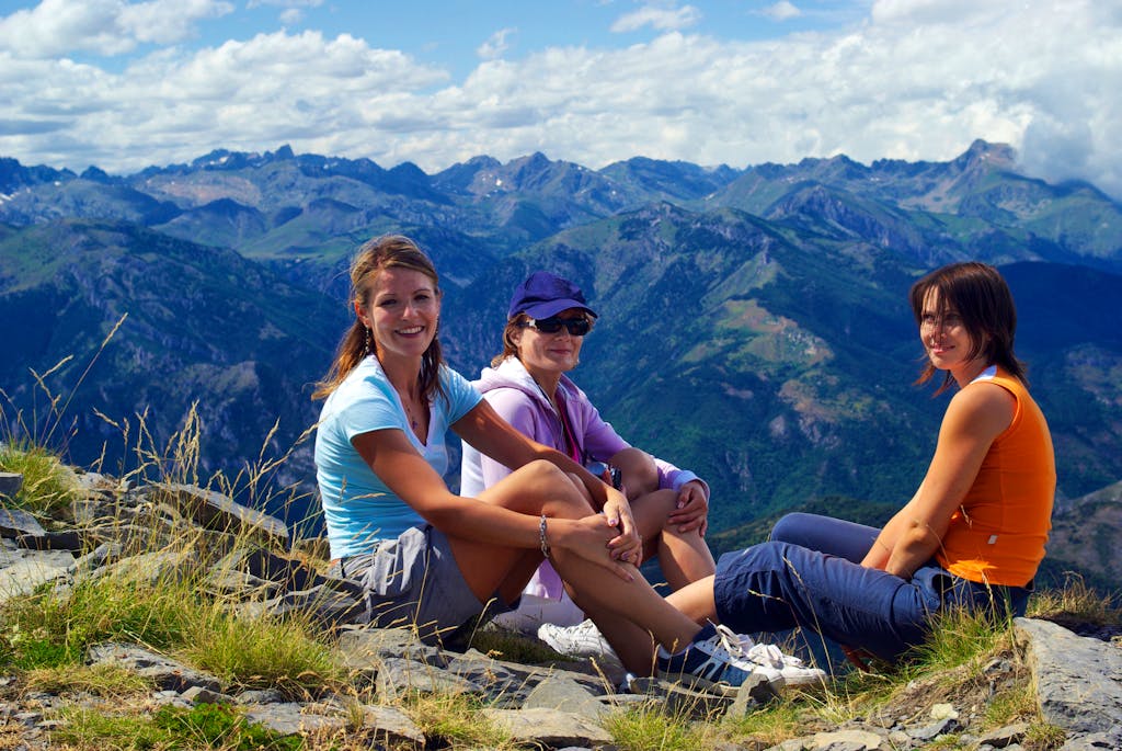 group of female friends hiking famous trails in Italy's Gran Paradiso National Park in Europe