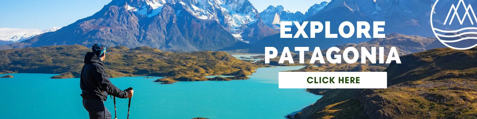 hiking trip in Patagonia; man with blue hiking jacket and beanie Person with hiking poles overlooks turquoise lake and mountains in Patagonia under a clear sky, capturing the spirit of a dream hiking trip; text reads "Explore Patagonia, Click Here.