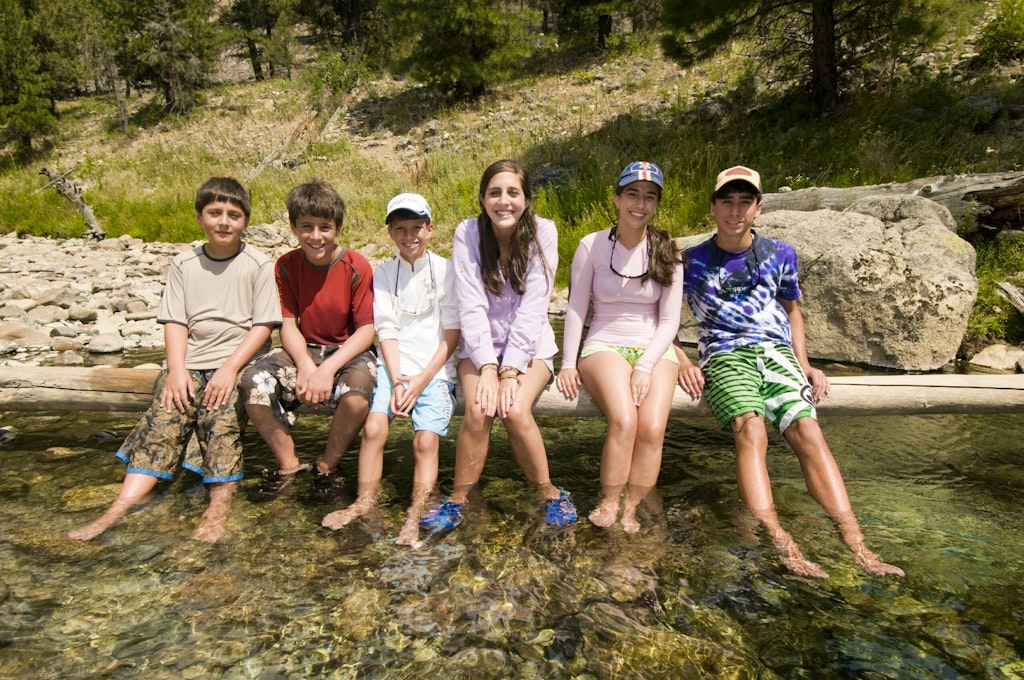 Children at a hot spring on the Middle Fork of the Salmon River with MT Sobek