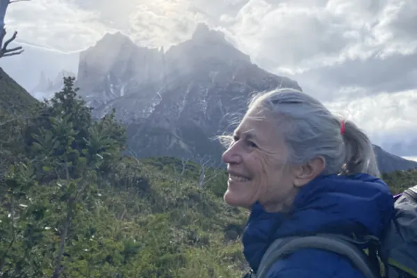 Diane gazing upward during a hike on a trail in Patagonia