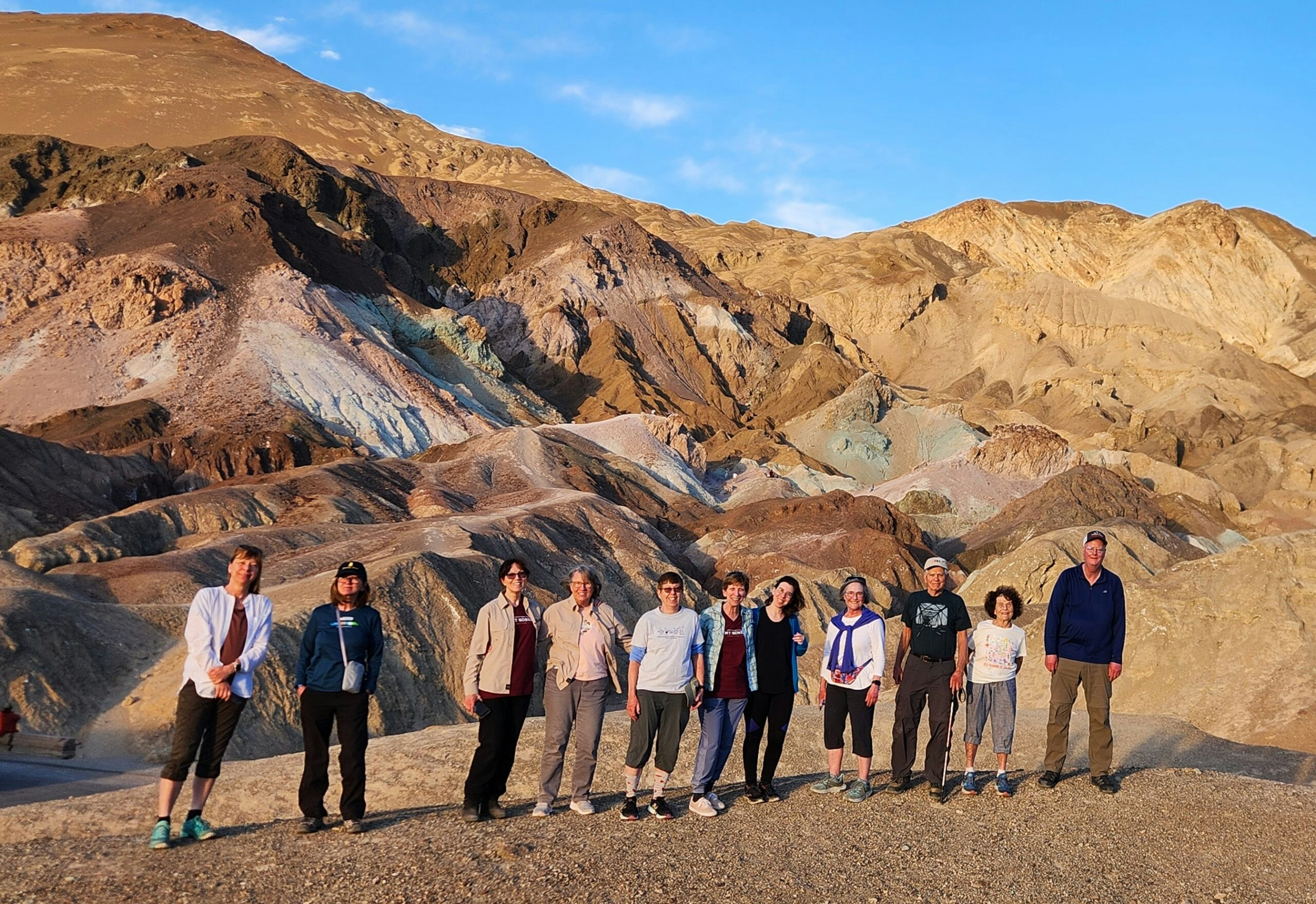 group of travelers near famous sand dunes in Death Valley National Park in California's park