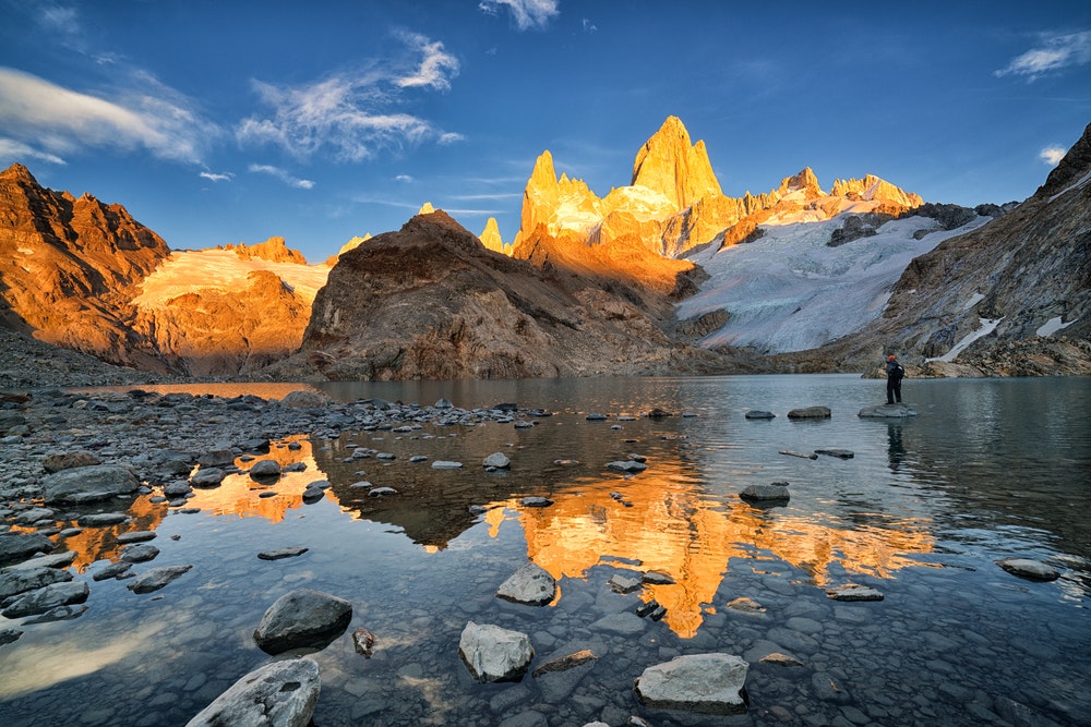 solo hiker looking out to mountains in Argentina