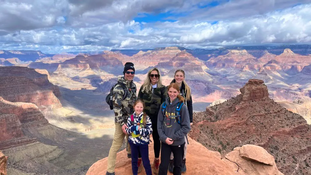 a family on a private Grand Canyon road trip in redrock country in Arizona and Utah
