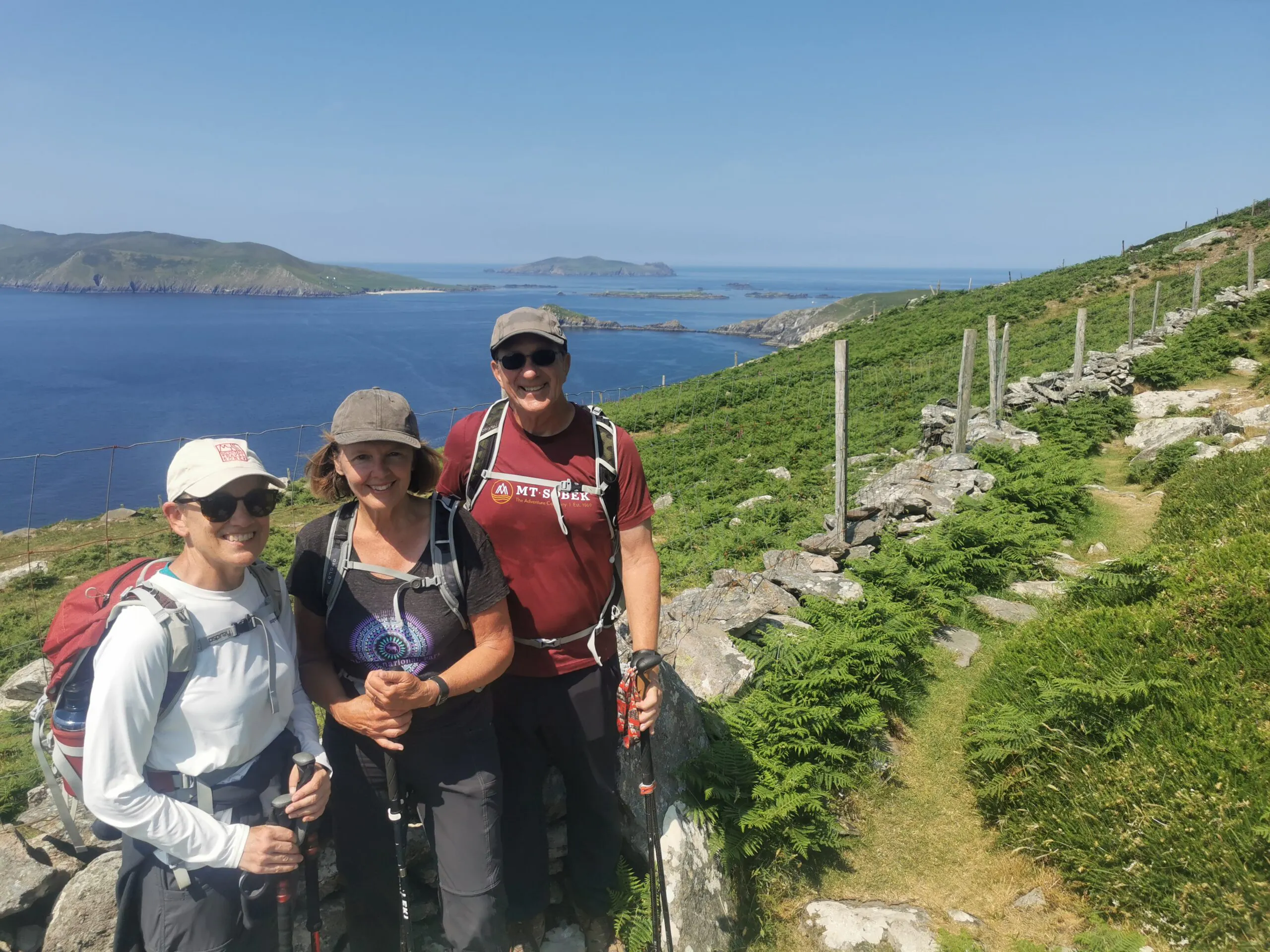 group of travelers passaging North to South famous hiking trail in Ireland, Europe