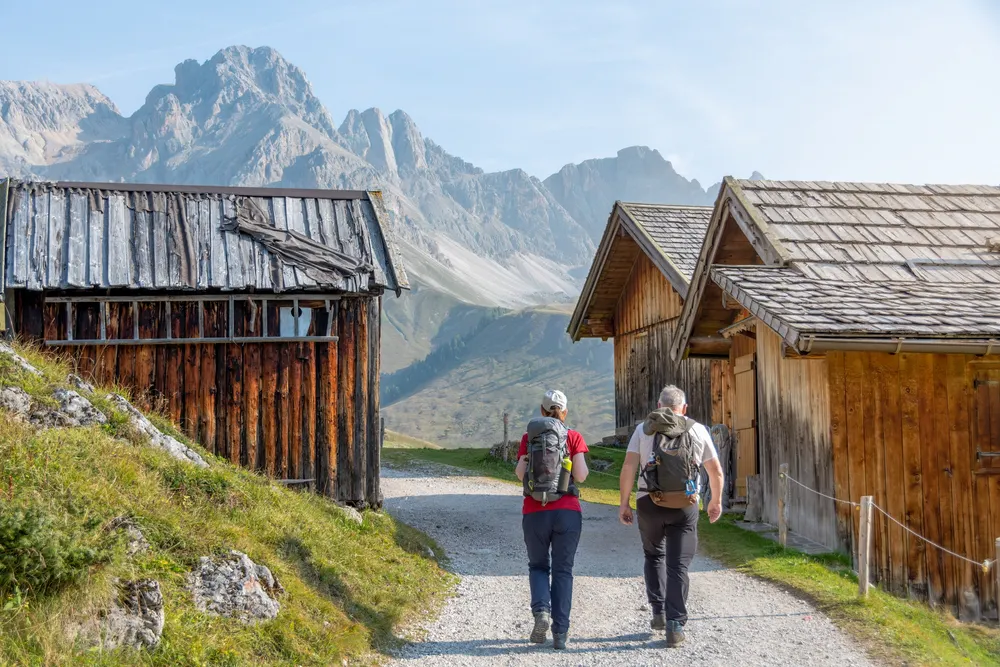two solo hikers on trail to Italian Alps on a MT Sobek adventure