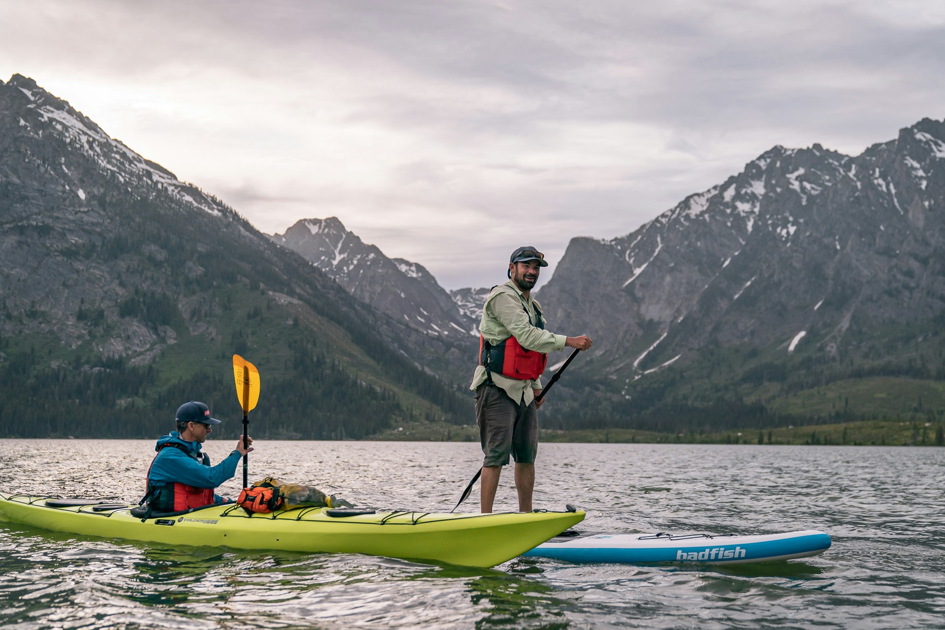 rafting on kayaks in Wyoming Grand Tetons scenery