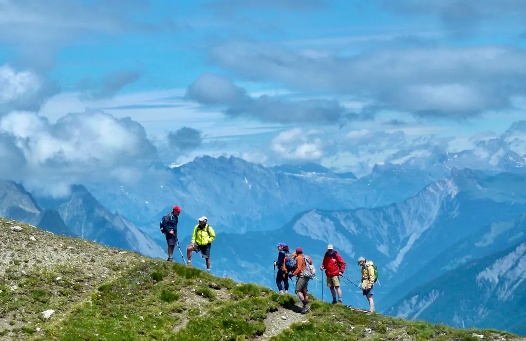 group of travelers on guided tour of Alps Mont Blanc in Europe