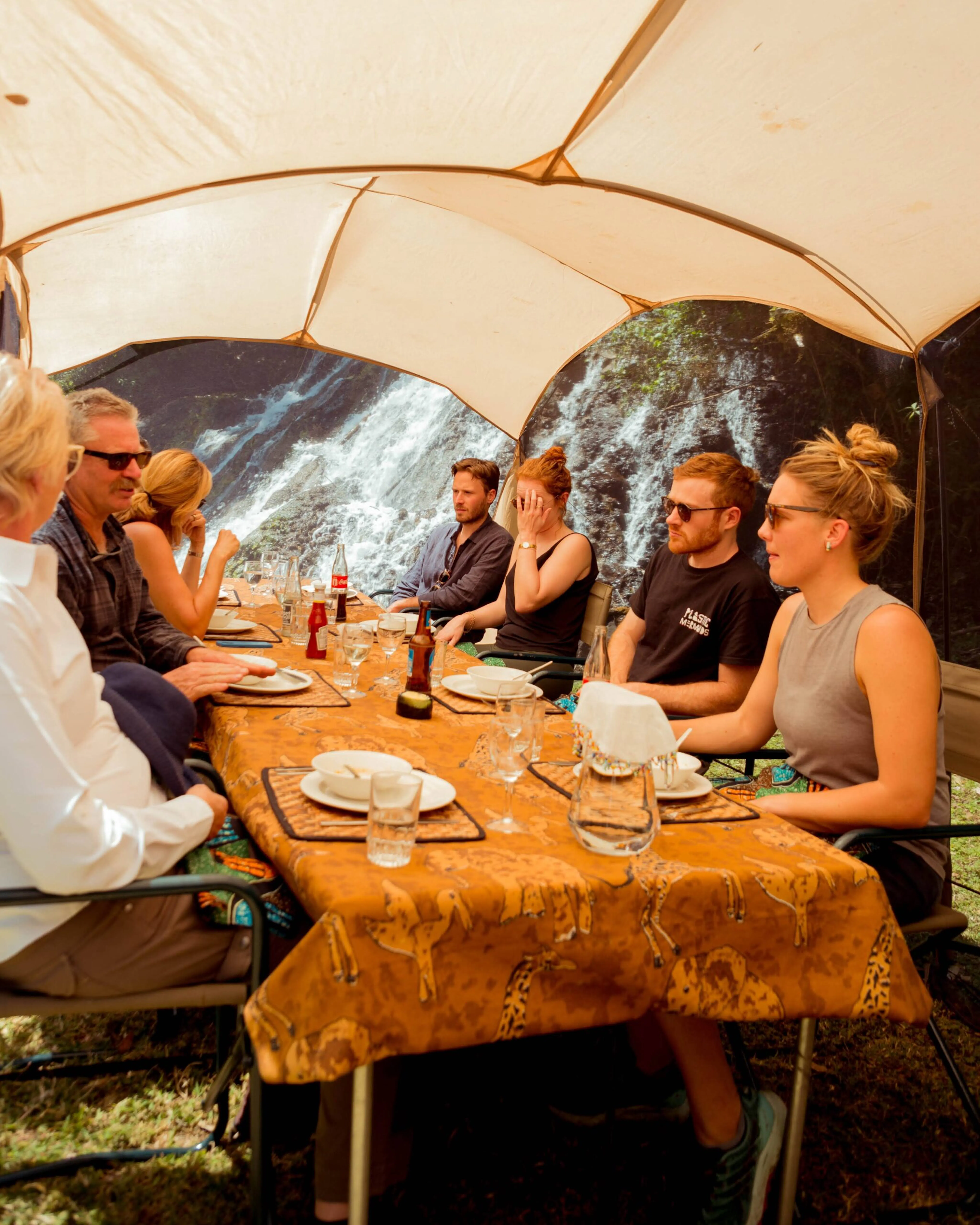 guests enjoying a sit down meal before kilimanjaro trek in tanzania