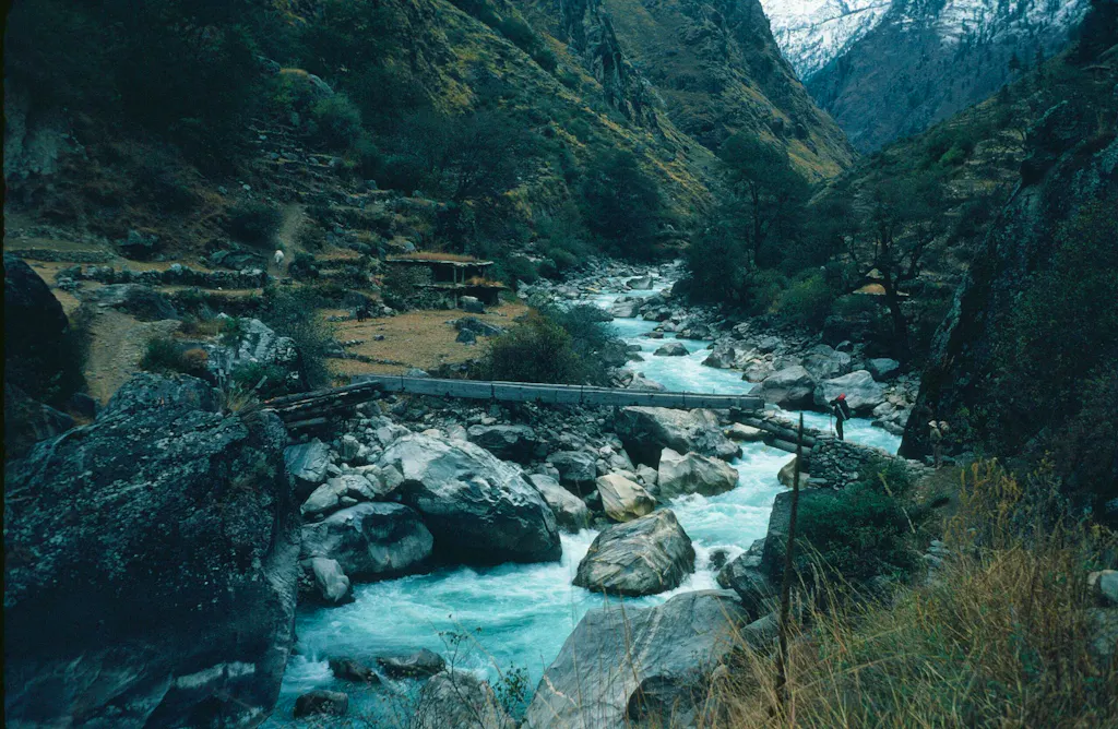 bridge with metal cables of Dudh Khosi River in Everest