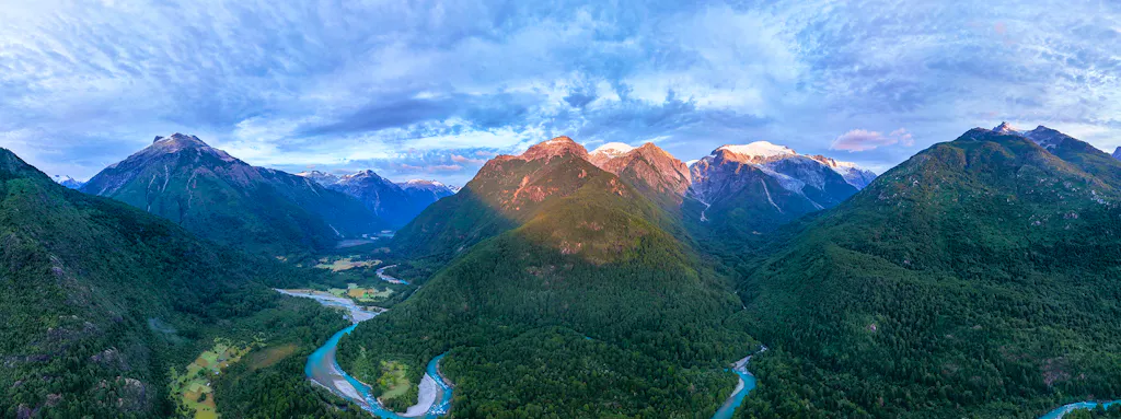 Stunning airplane view of Cochamo Valley in the northern Patagonia region of Chile, with jagged peaks, a turquoise river and deep forests