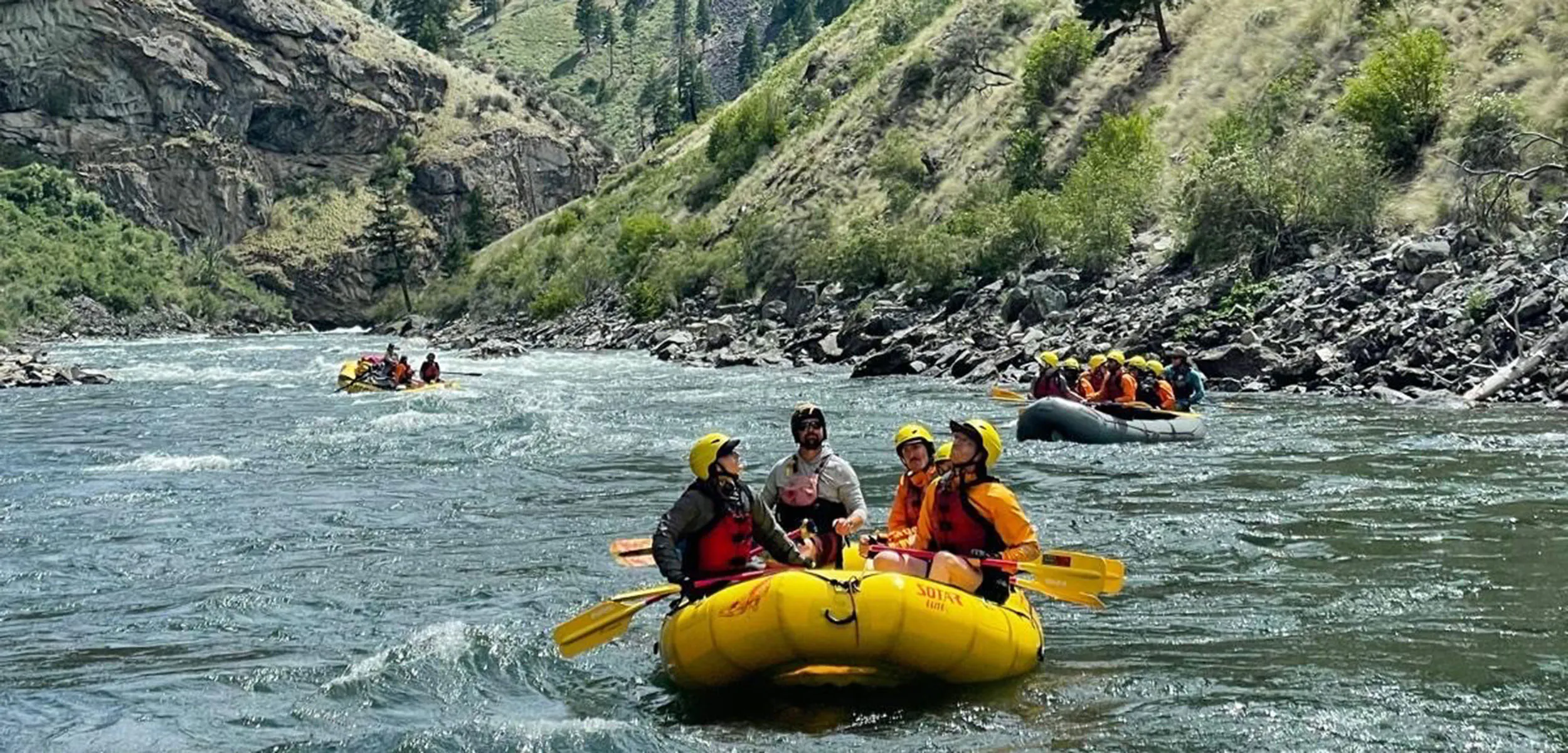 MT Sobek Middle Fork of the Salmon River rafts filled with joyful guests in Idaho
