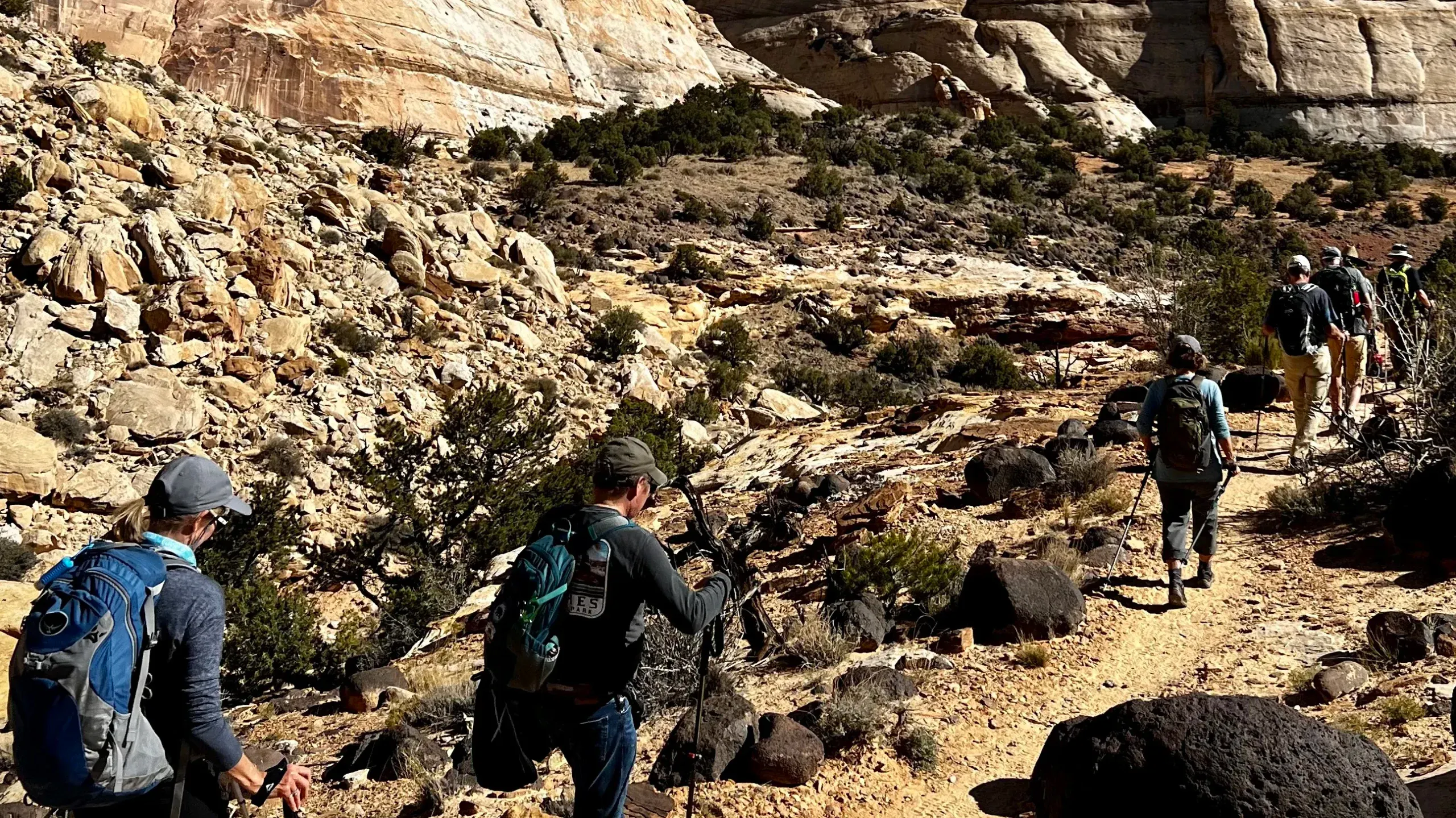 trekking the beehive traverse with group of travelers in utah capitol reef