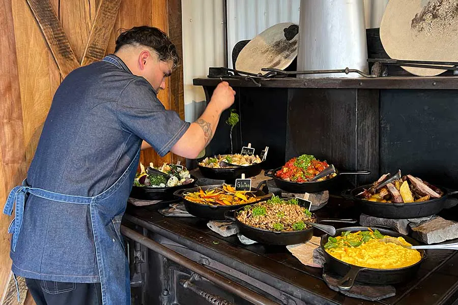 Argentinian chef preparing a meal in the Patagonia region of South America
