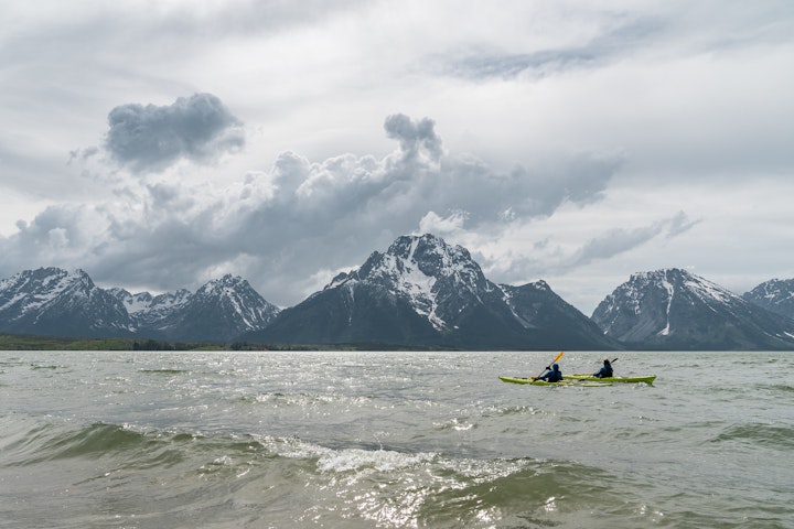 kayakers mountain - Wyoming Grand Teton Kayaking