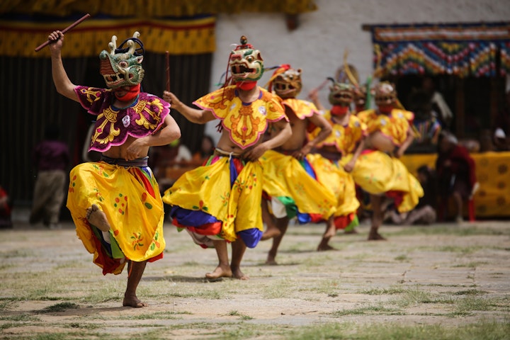 masked dancers - Bhutan Trekking Tour & Cultural Discovery